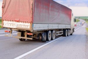 Flat out and damaged wheeler semi truck burst tires