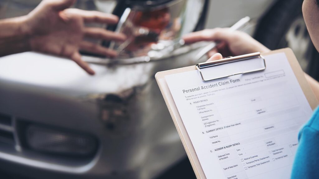 insurance claim form on clipboard