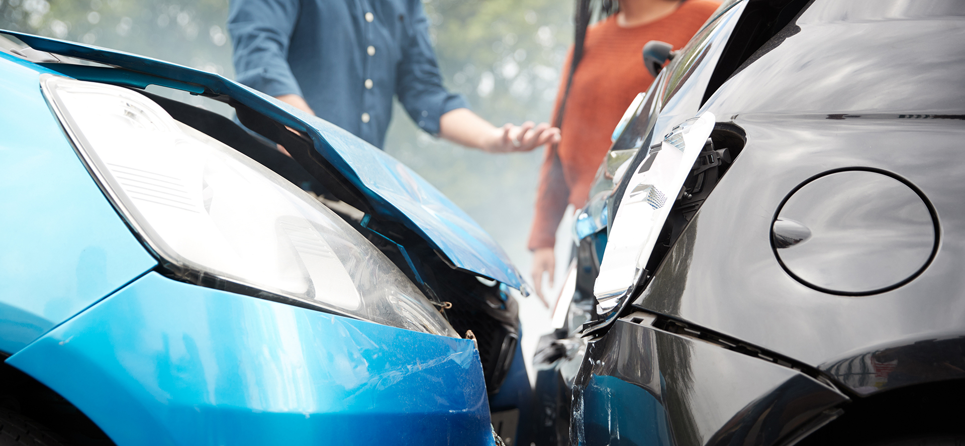 Two Angry Motorists Arguing Over Responsibility For Car Accident