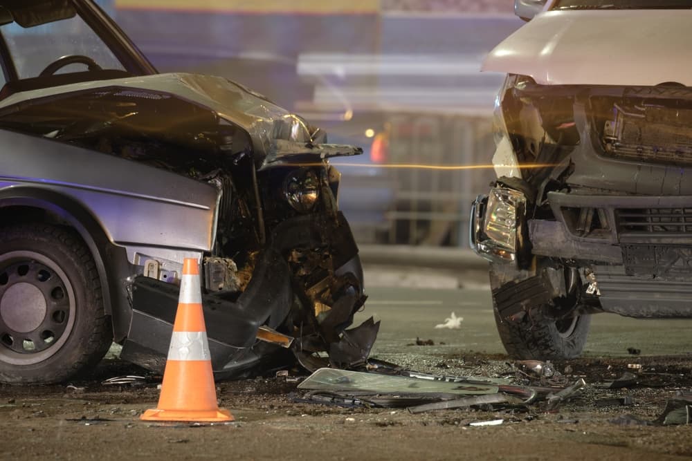 Collision between two cars in night at highway